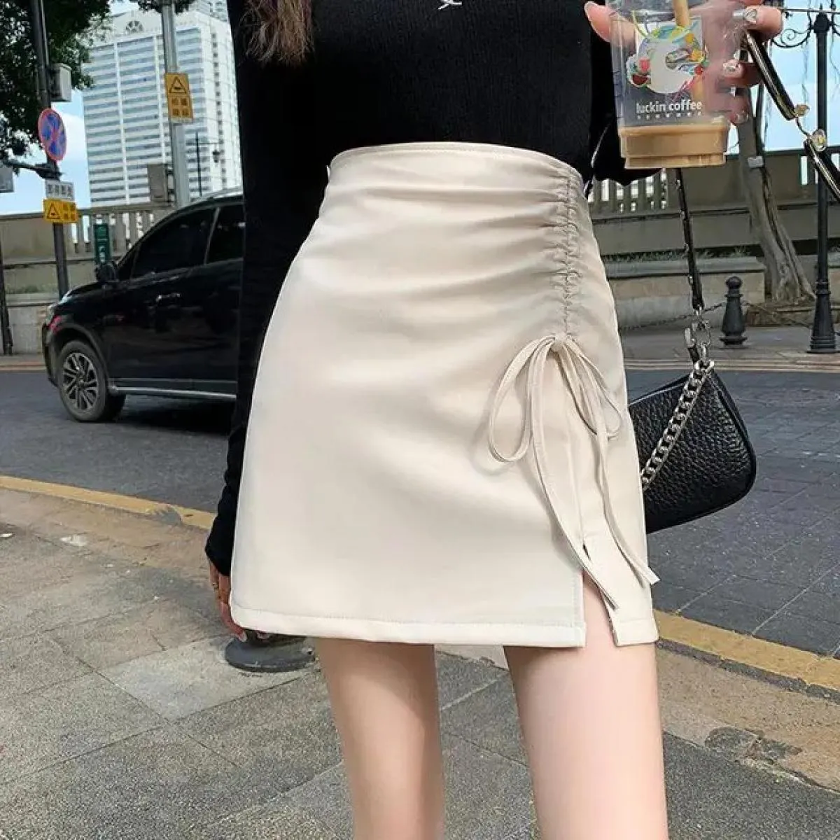 Gonna autunno inverno 2023 design da donna con coulisse divisa in pelle Pu gonne a vita alta Slim gonna a linea anca avvolta