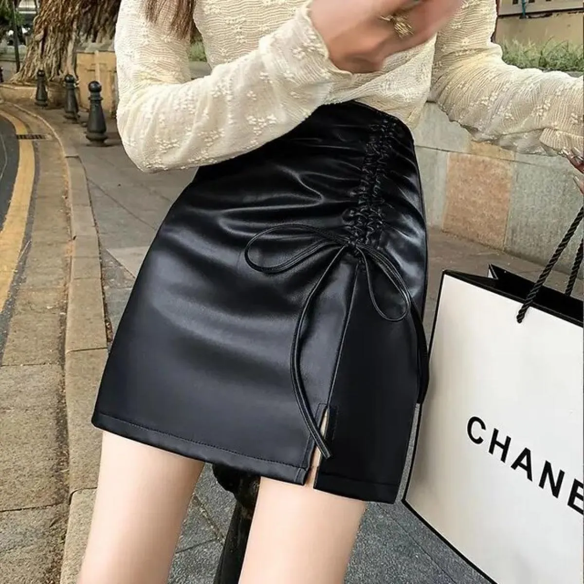 Gonna autunno inverno 2023 design da donna con coulisse divisa in pelle Pu gonne a vita alta Slim gonna a linea anca avvolta