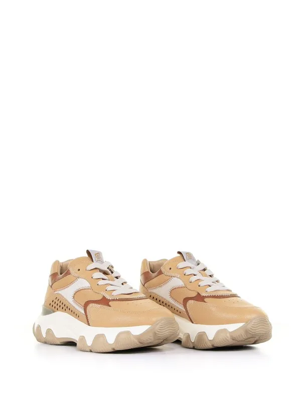 Hyperactive sneaker with embossed logo