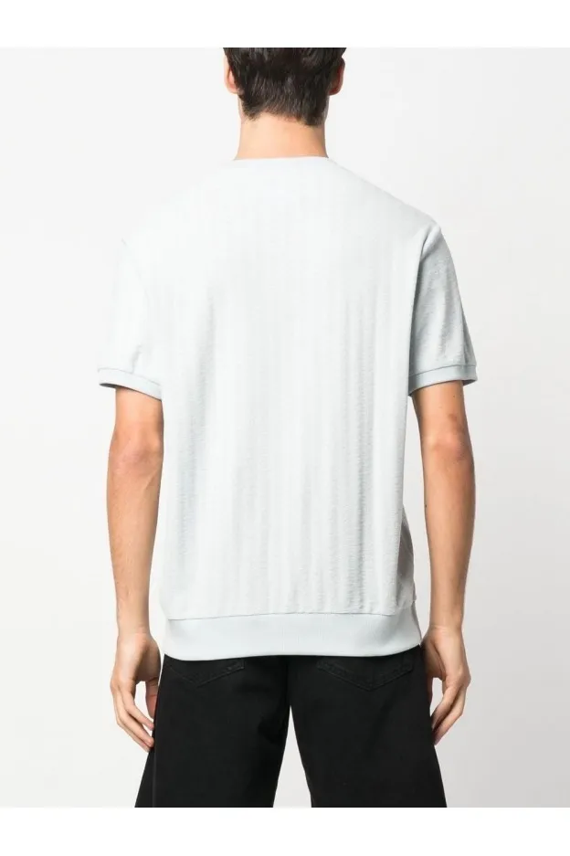   Moschino     Moschino T-shirt con stampa grafica    