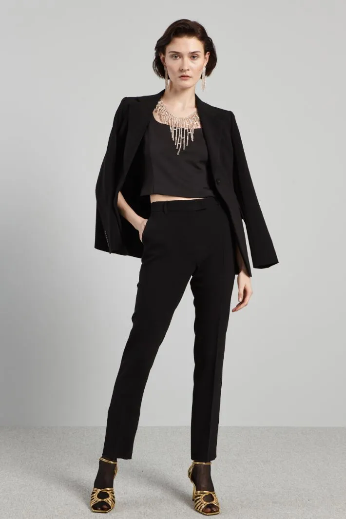 Pantaloni con piega stirata