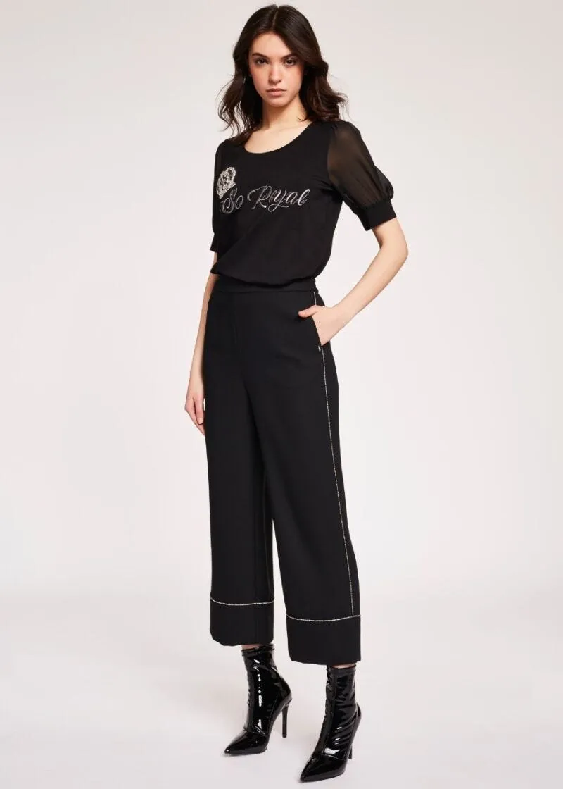 Pantaloni fluidi con strass