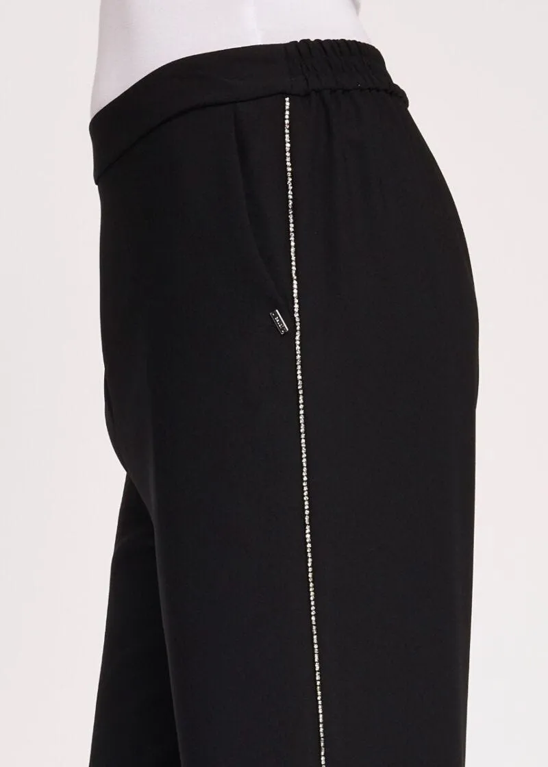 Pantaloni fluidi con strass