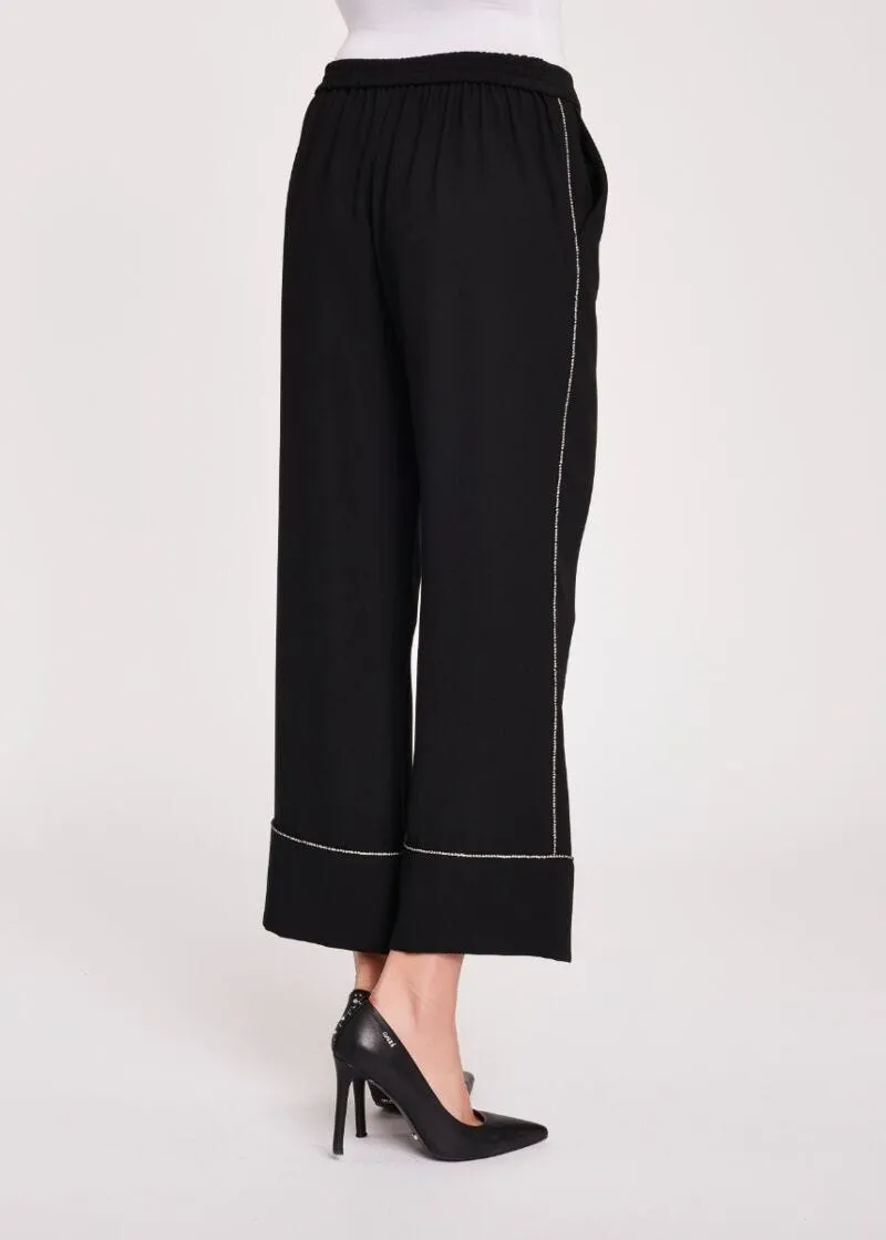 Pantaloni fluidi con strass